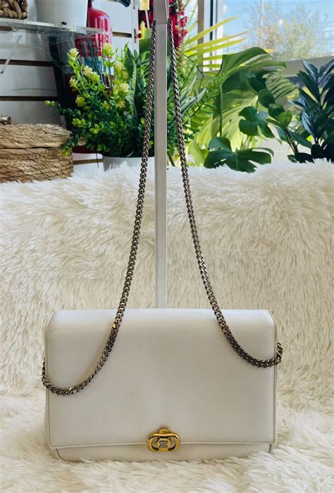 celine white clutch|Celine clutch with chain.